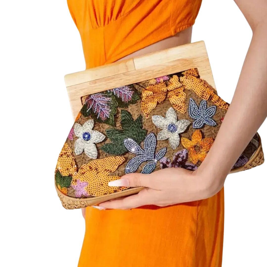 Elegante bolso de mano con flores y lentejuelas: perfección social